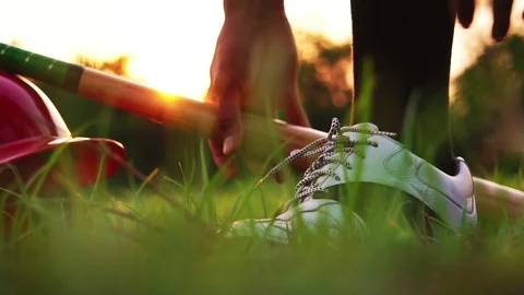 He glanced baseball before starting the competition in the field Stock Footage 106137723