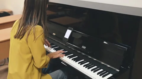 He harmony between pianist and piano unfolds with each note. A moment of pure Stock Footage 305651150
