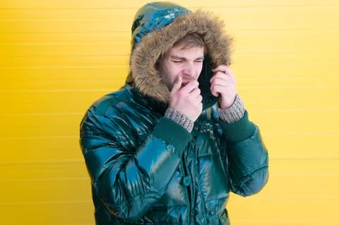 He has got cold and flu. Casual fashion coat for cold winter conditions Fotos de archivo