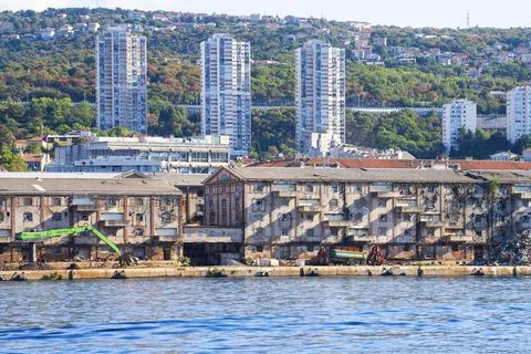 He image shows a waterfront with old, weathered industrial buildings in the.. Stock Photos