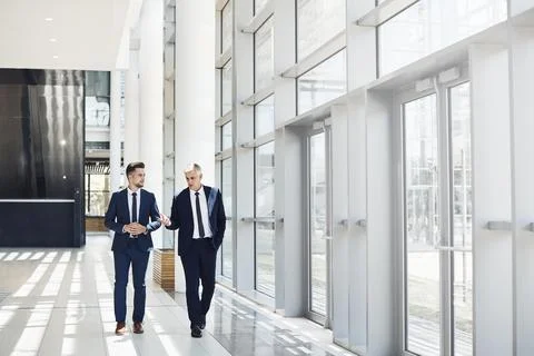 He is learning as much as he can from the CEO Stock Photos