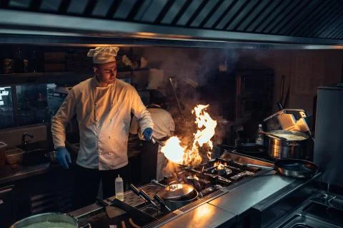He makes magic in the kitchen Stock Photos