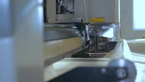 He printing machine prints the code on the paper (fabric) date, time code Stock-Fotos