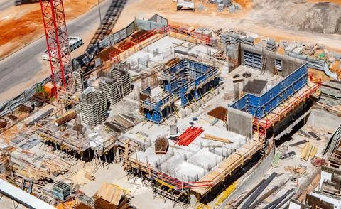He process of building a multi-storey building, pouring concrete, laying Stock Photos