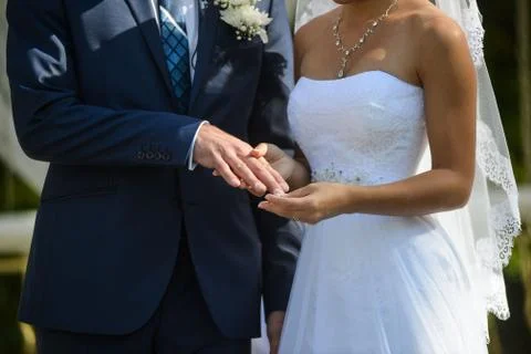 He Put the Wedding Ring on Her Stock Photos