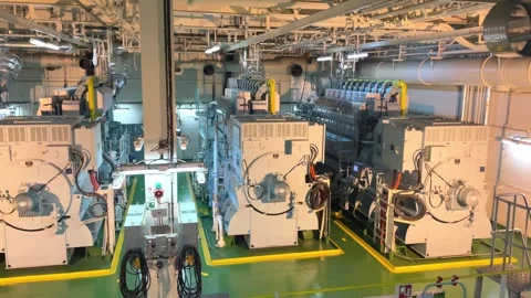 He raw, utilitarian atmosphere found in the engine room of a modern ship. Stock-Footage 331353427