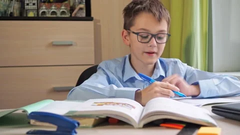 He speaks to the camera after he remembers an important thought and shows his Stock Footage 172257501