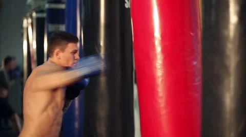 He is unstoppable. Professional fighter exercising boxing at the fight club 스톡 동영상 58556426