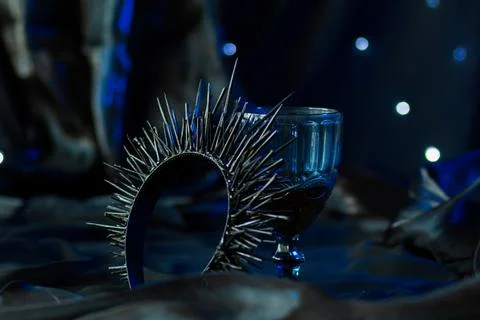 Head accessory with needles next to the glass Stock Photos
