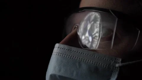 Head and Brain MRI Scan Analysed by Doctor Radiologist Wearing Glasses and Mask Stock Footage 147962442