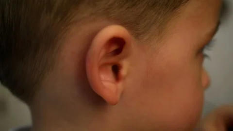 The head and ear of the child close-up Stock Footage 89103527