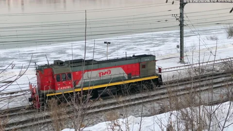 The head car of the Russian Railways train travels on rails Stock Footage 151136783
