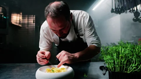 Head Chef Completing His Work With Some Herbs Stock Footage 279724888