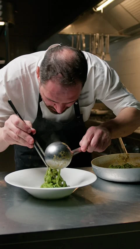 Head Chef Plating A Colorful Spaghetti Dish Stock Footage 272983663