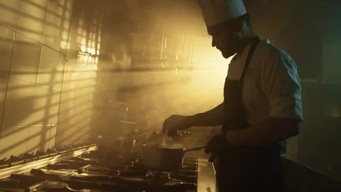 Head Chef preparing a meal at early morning Stock Footage 276358333