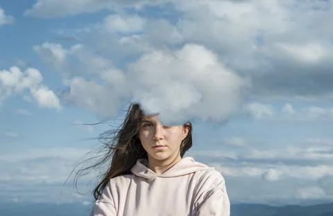 Head in the clouds concept Stock Photos