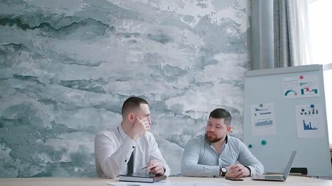 The head of the company furiously throws documents promoting the goods Stock Footage 125634674