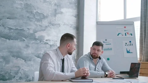 The head of the company furiously throws documents promoting the goods Stock Footage 125634785