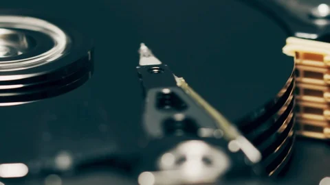 Head of computer hard disk drive reveals DATA word Stock Footage 120977327