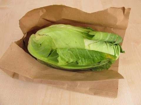 Head of cone cabbage in paper bag Foto stock