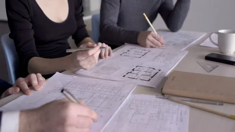 Head of construction project approves work from engineer and architect. Stock Footage 85678526