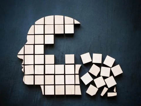 Head from cubes as concept of mental problems or dementia. 스톡 사진