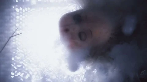 Head doll to cook in boiling liquid for a ritual 스톡 동영상 82238976