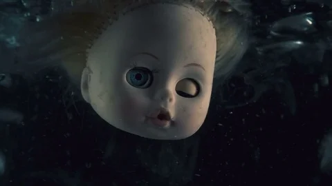 Head doll to cook in boiling liquid for a ritual Stock Footage 82241484