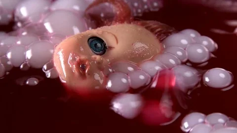 Head doll to cook in boiling liquid for a ritual 스톡 동영상 82246940