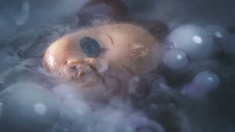 Head doll to cook in boiling liquid for a ritual 스톡 동영상 82247260