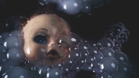 Head doll to cook in boiling liquid for a ritual 스톡 동영상 82247381