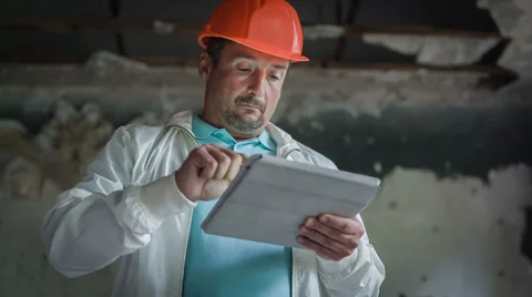 A Head Is Examining Drafts On The Tablet 3 動画素材 30441739