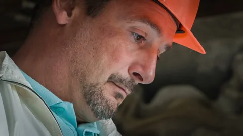 A Head Is Examining Drafts On The Tablet. Close-Up RAW Video 1 Stock Footage 30441682