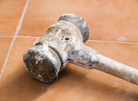 Head hammer close up on tile background Stock Photos