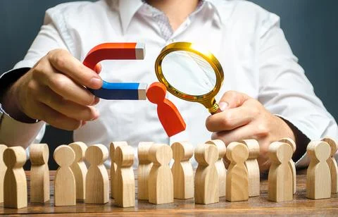 Head of Human Resources examines a candidate red figure. Recruiting new wor.. Stock Photos