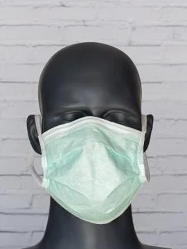 Head image of mannequin wearing a surgical mask Stock Photos