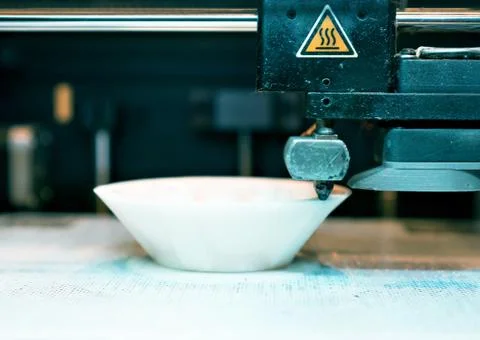 Head of industrial 3d printer in action. Stock Photos