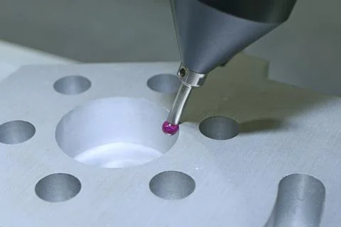 Head with integral touch-trigger probe of measuring machine working. Indust.. Stock Photos