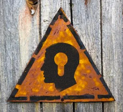 Head with a Keyhole Icon on Rusty Warning Sign. Stock Illustration