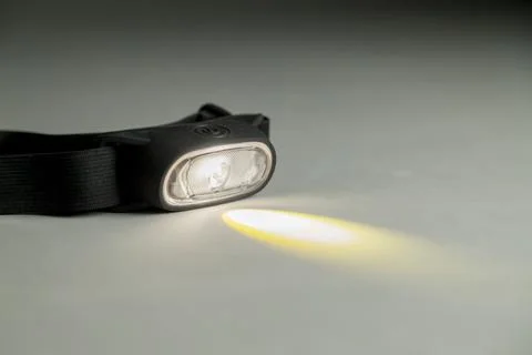 Head lamp. Camping concept. Light concept. Stock-Fotos
