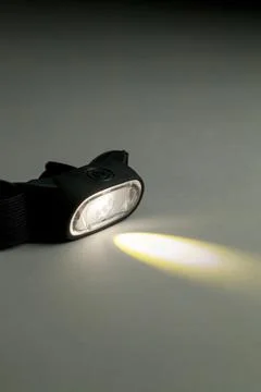 Head lamp. Camping concept. Light concept. Stock Photos