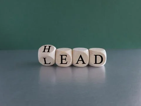 Head lead symbol. Turned the cube and changes the word 'lead' to 'head'. Stock Photos