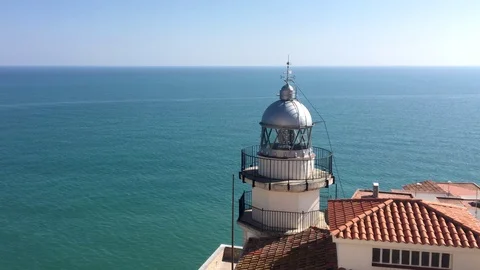 Head Lighthouse Before Sunset Sets Over mediterranean sea , aerial 4k Stock Footage 87804405