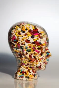 Head made of glass with tablets Stock Photos