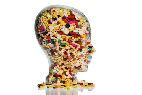 Head made of glass with tablets Stock Photos