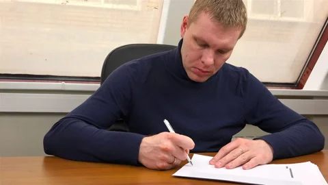 The head makes the conclusion and puts the signature on the documents Stock Footage 99949002