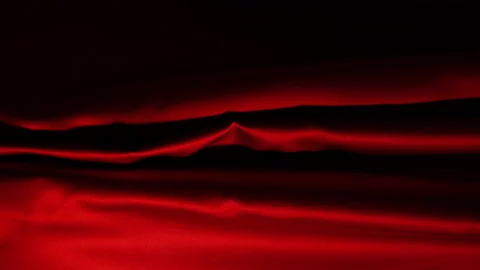 Head of masked man pop up from a red curtain Vertical video horror lights Stock Footage 220340184