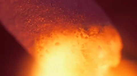 Head matches is lit a bright flame. Macro Stock Footage 61551062