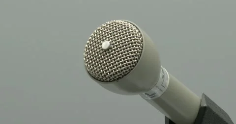 Head of Microphone - Close Up - Grey Background Stock Footage 166010949