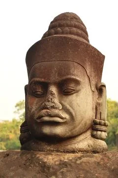 The head of one of the many stone statues lined up in front of the Southern G Stock Photos